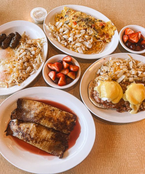 A table with a variety of food on it.