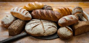a bunch of breads that are on a table