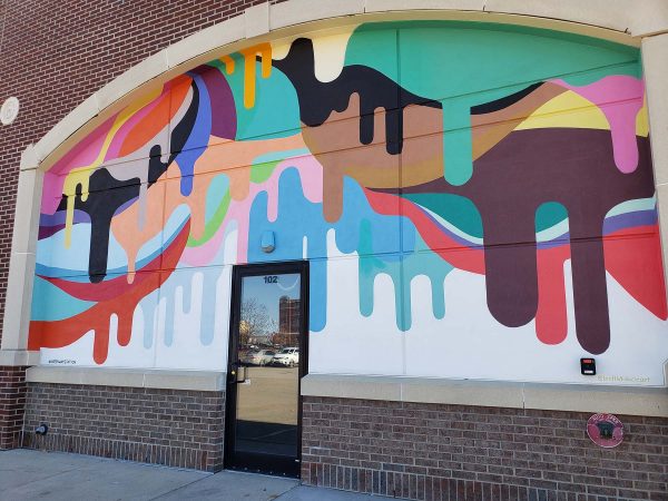 a large mural on the side of a building.