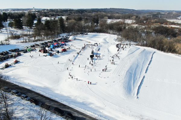 an aerial view of a ski resort in the winter.