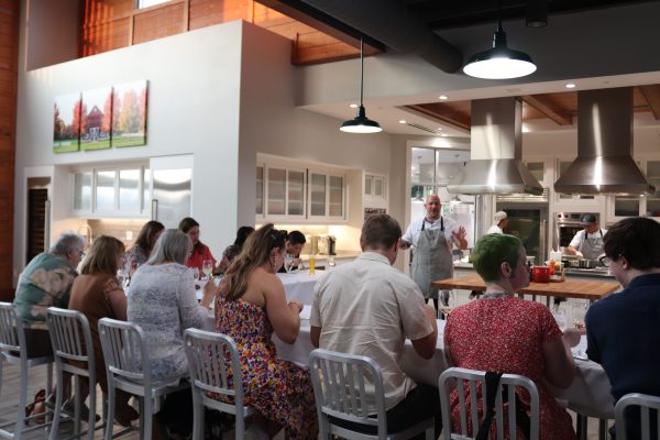 A group of people sitting at a table.
