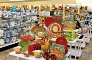 a room filled with lots of plates and vases