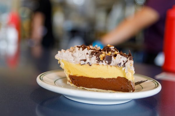 A piece of pie on a plate.