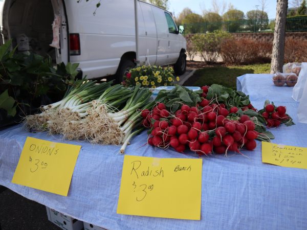 a table topped with lots of fresh produce.