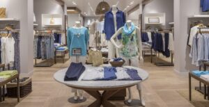 a clothing store with a variety of clothing on display