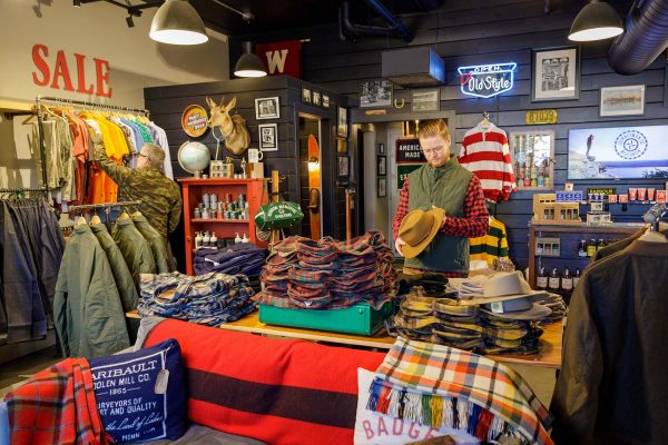 a store with a lot of clothing on display