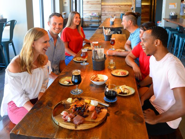 A group of people sitting at a table.